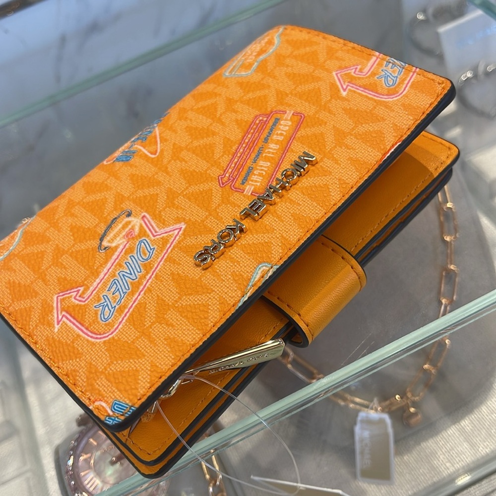 Michael Kors Jet Set Travel Md Printed Signature Logo Bi-Fold Wallet
Pop Orange - Picture 7 of 16